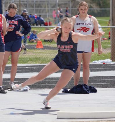 Calyn Baker spins her way to a gold medal finish in the shot put at Belleville.