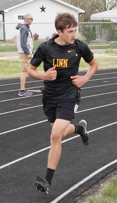 Greyson Ohlde checks the track during a race at the Belleville Lions Club meet.