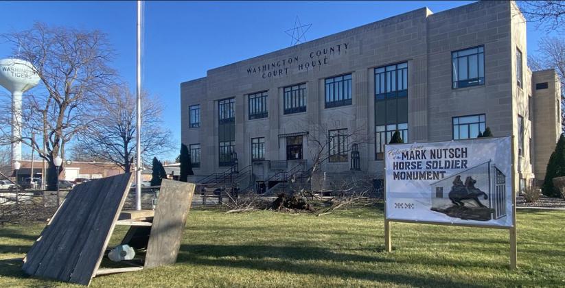 A Canada Red Cherry Tree was uprooted in front of the Washington County Courthouse and a Christmas nativity scene toppled in Wednesday’s wind storm.
