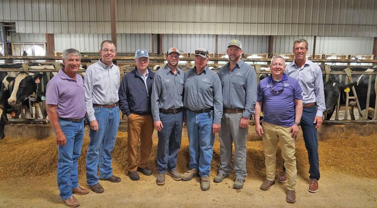 Part of the tour group at Ohlde Dairy last Tuesday morning were, from left, Joe Newland, Marshall Stewart, Mike Beam, Kyler Ohlde, Steve Ohlde, Levi Ohlde, Richard Linton and Terry Holdren.