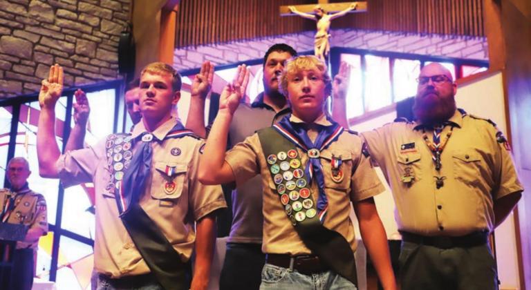 Drew Buhrman, left, and Kobe Hoover say the Boy Scout Oath during a recent ceremony to recognize their Eagle Scout efforts. Eagle Scouts Justin Lehman, Travis Lehman and Tyler Kern also attended.